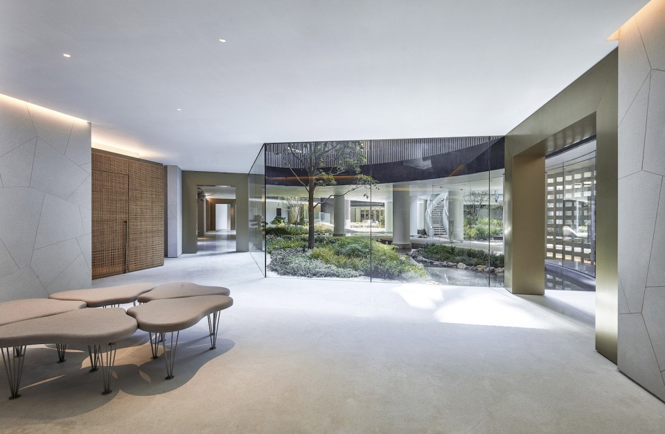 clubhouse and the entrance lobby area of luxury condominium fleur pavilia in hong kong china by uchida design inc