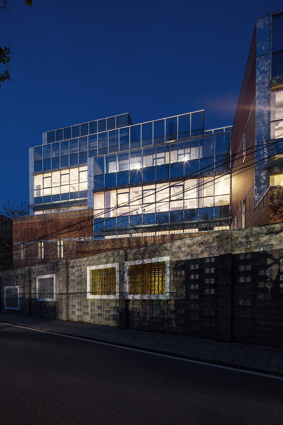 sunlight into the glass renovation of the administrative office building of huijia international school in beijing china by why co