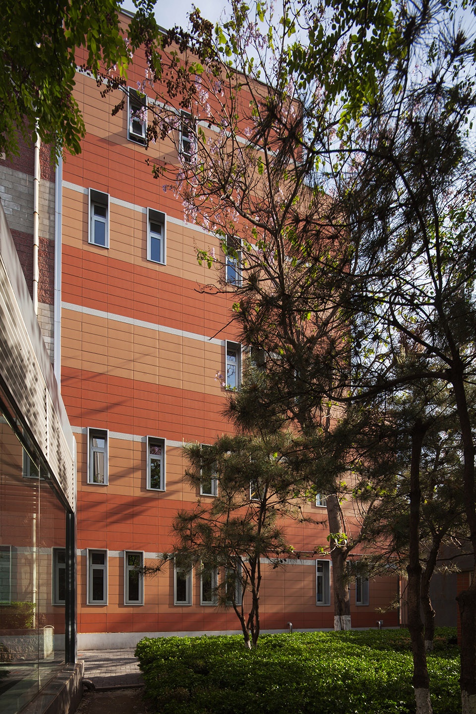 sunlight into the glass renovation of the administrative office building of huijia international school in beijing china by why co