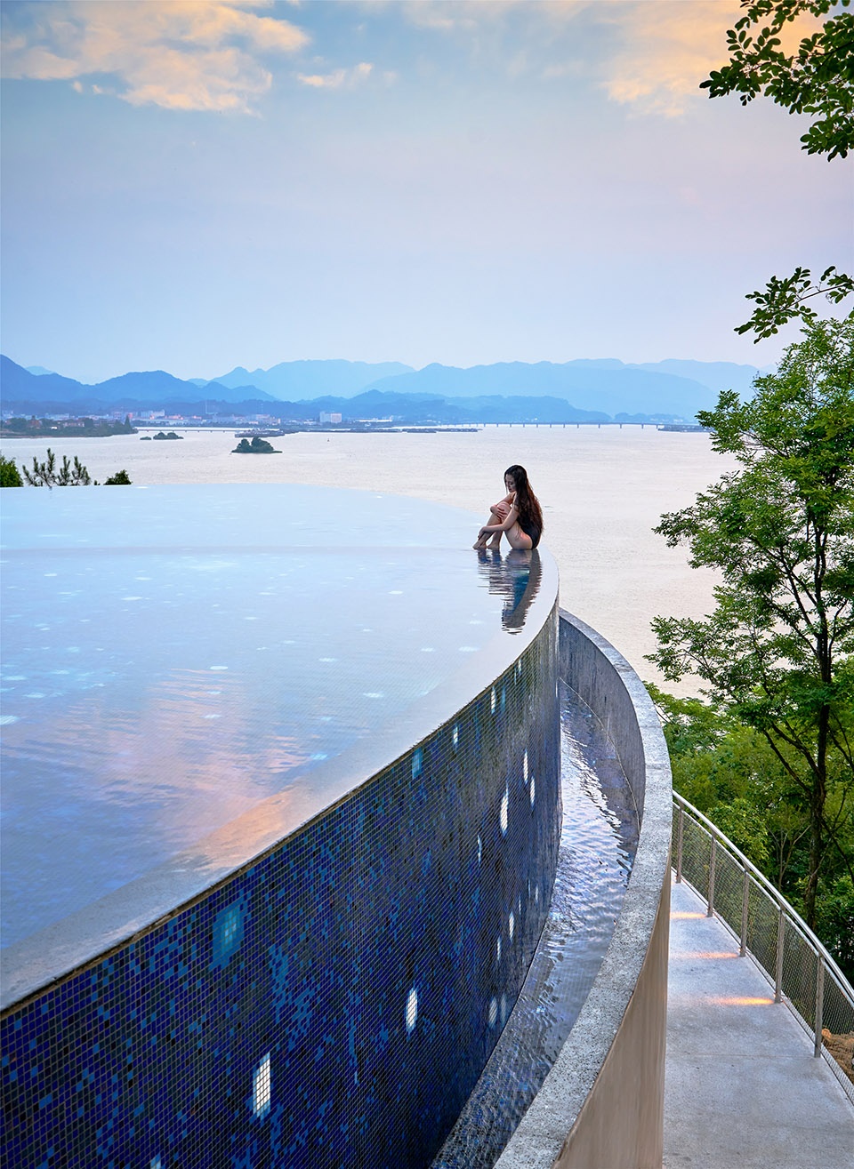 star boat overhead swimming pool on the bank of fuchun river in hangzhou china by the design institute of landscape architecture china ac...