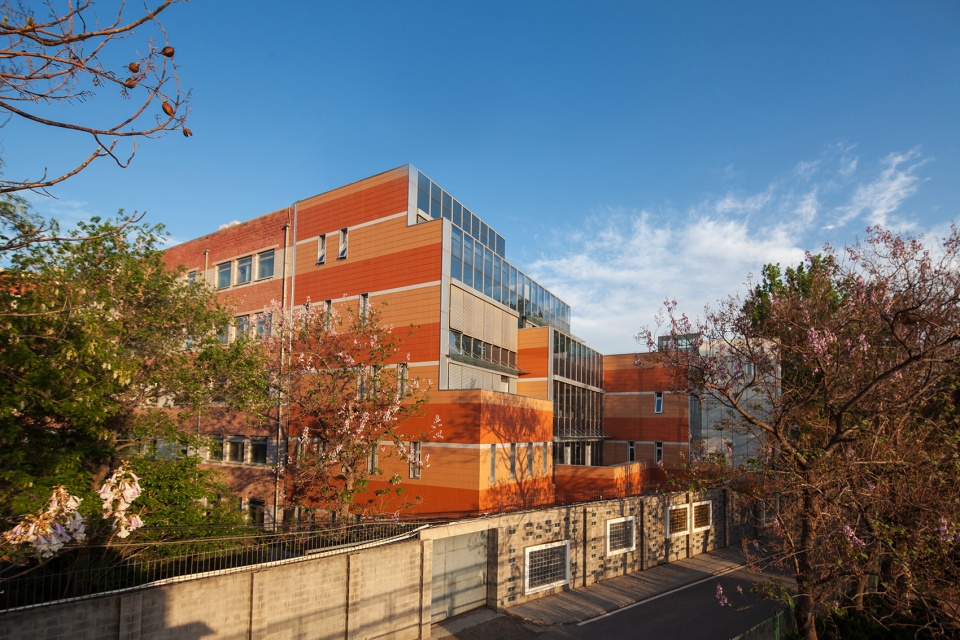 sunlight into the glass renovation of the administrative office building of huijia international school in beijing china by why co