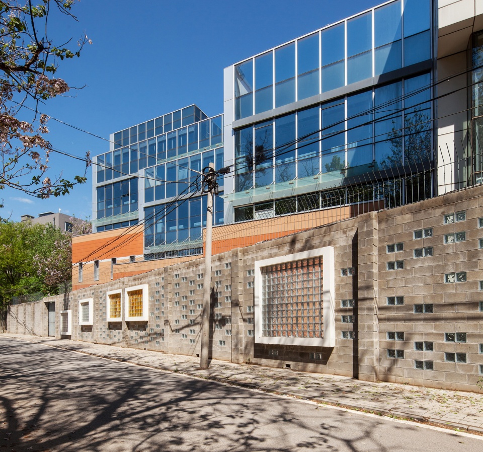 sunlight into the glass renovation of the administrative office building of huijia international school in beijing china by why co