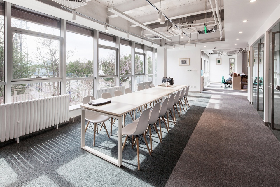 sunlight into the glass renovation of the administrative office building of huijia international school in beijing china by why co