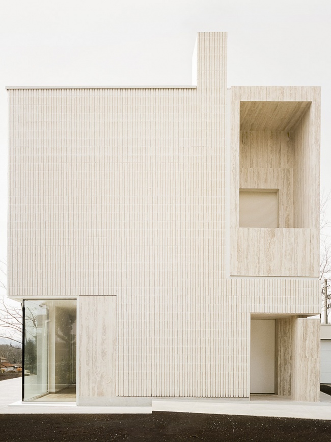 the house of the archeologist by lca architetti