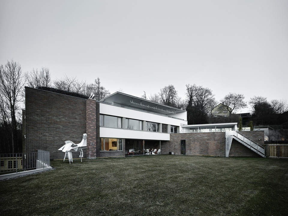 extension house grieder swarovski by afgh architects