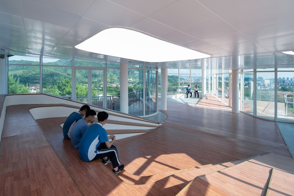 inside the mountain student club of heyuan senior high school by yuanism architects