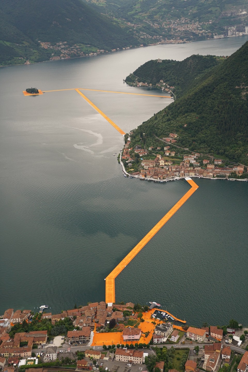The Floating Piers In the morning of June 16 unfurling of 1000000 square meters of shimmering yellow fabric on the piers and pedestrian s...