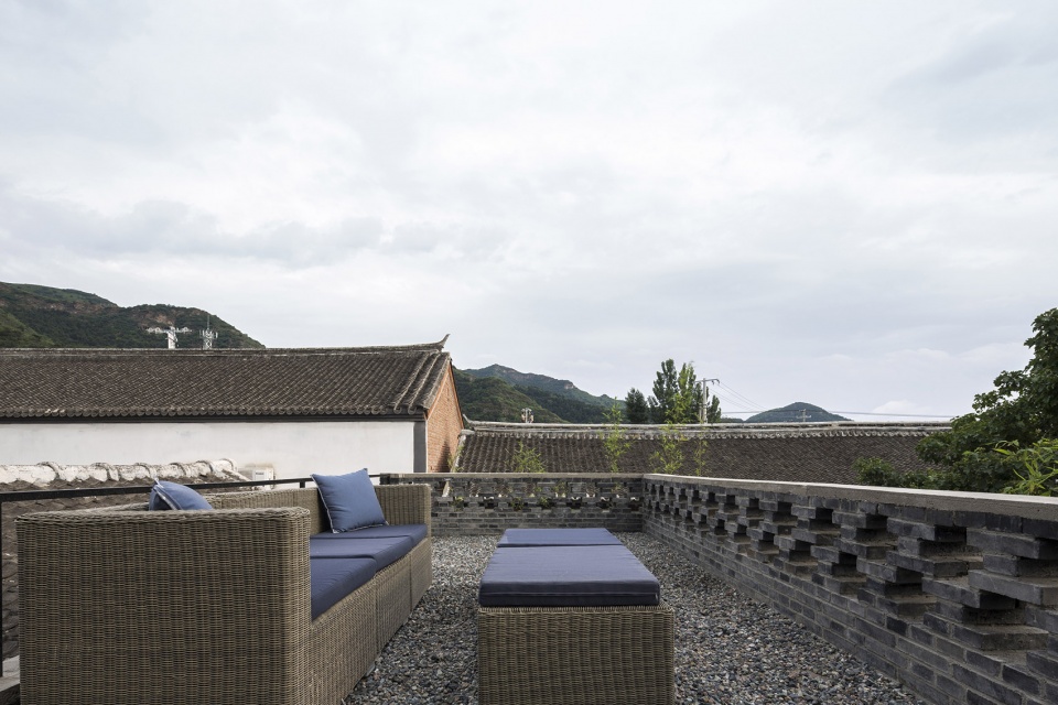 the shared village space evolution of red fruit tree small tavern by evolution design