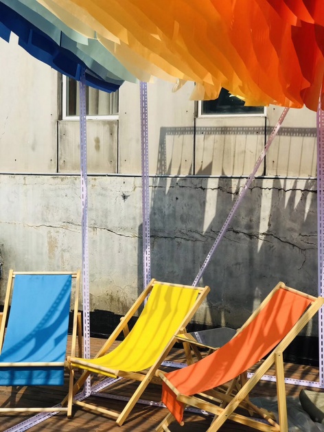 a little nap under the sunset installation by abandoned city bigrice design