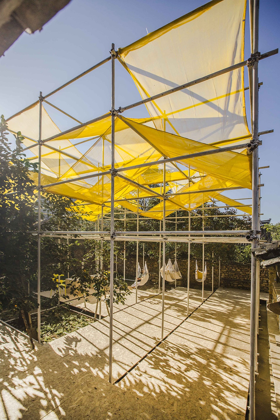 temporary exhibition facilities for harvest festival in shichengzizi village china by fu yingbin