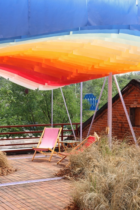 a little nap under the sunset installation by abandoned city bigrice design