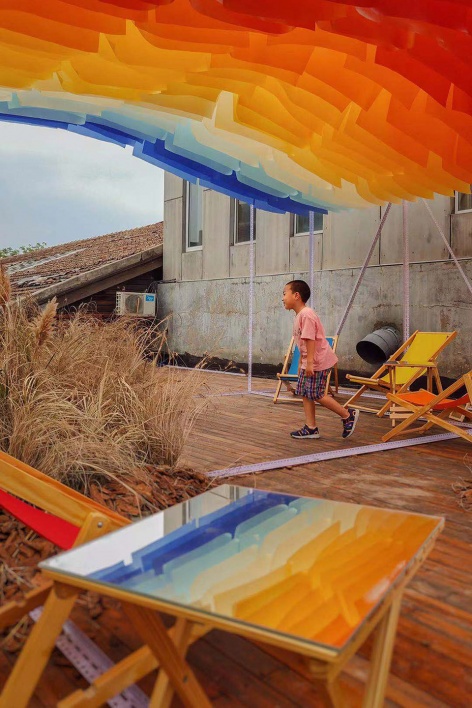 a little nap under the sunset installation by abandoned city bigrice design