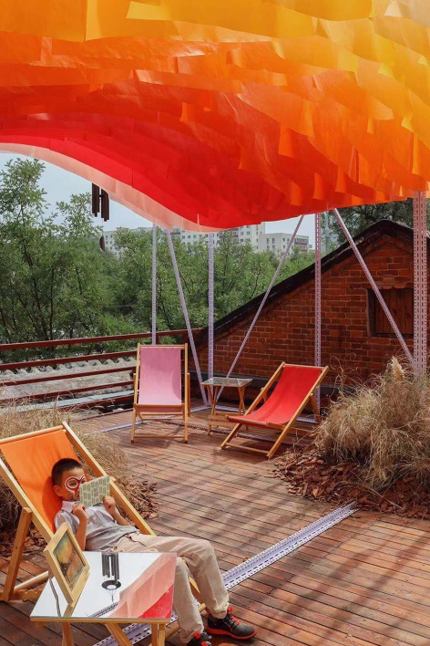 a little nap under the sunset installation by abandoned city bigrice design
