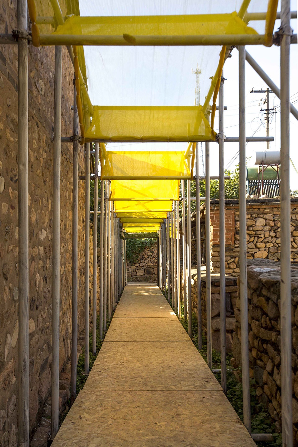 temporary exhibition facilities for harvest festival in shichengzizi village china by fu yingbin