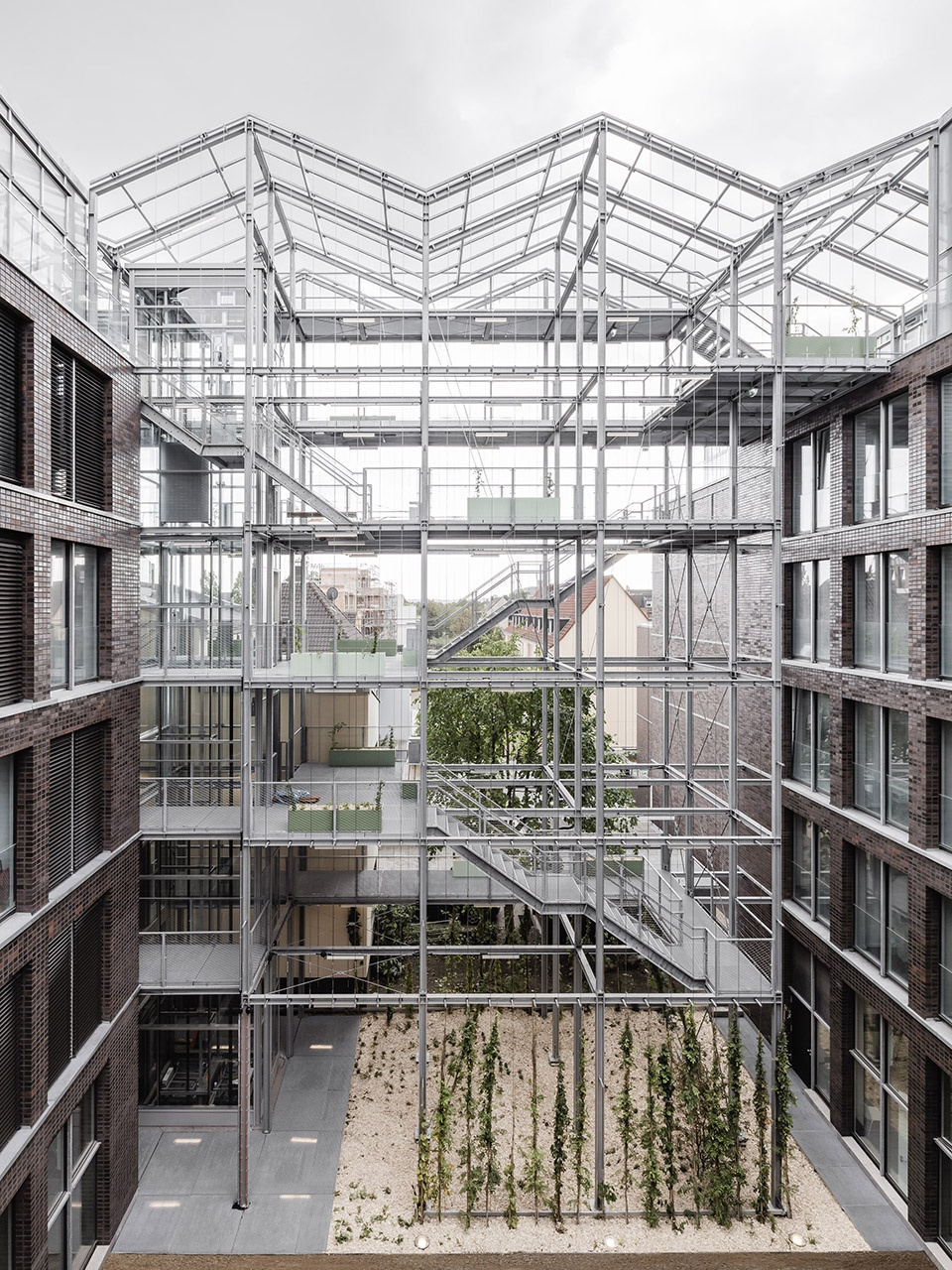 administration building with rooftop greenhouse at the altmarkt oberhausen by kuehn malvezzi