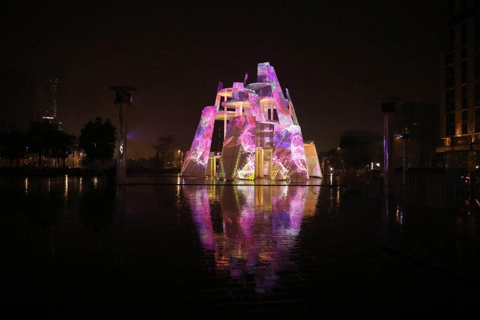 architectural lighting shuttles light and shadow nanjing time tower china by purilighting