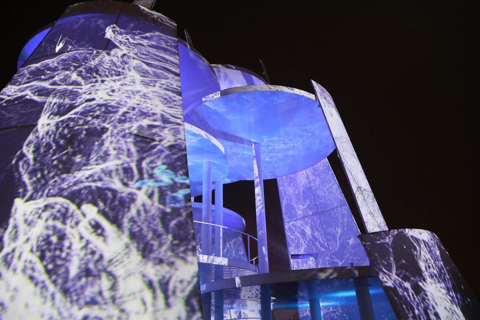 architectural lighting shuttles light and shadow nanjing time tower china by purilighting
