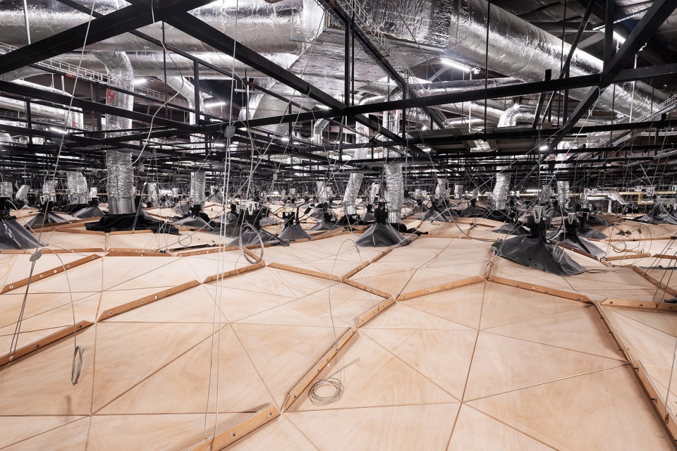 wood skin covers the dome and walls of the new assembly hall of the united nations palace in geneva
