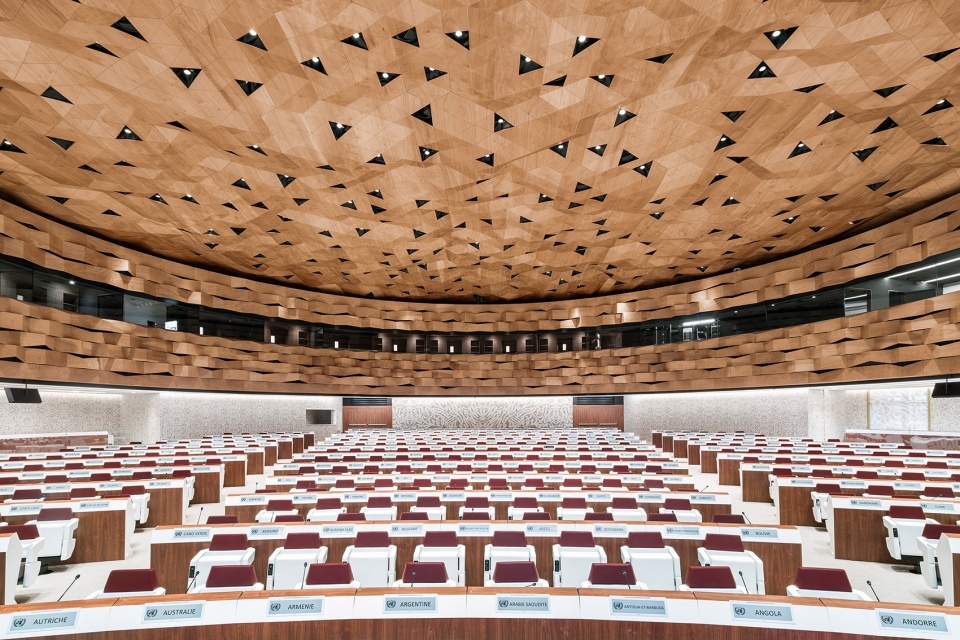 wood skin covers the dome and walls of the new assembly hall of the united nations palace in geneva