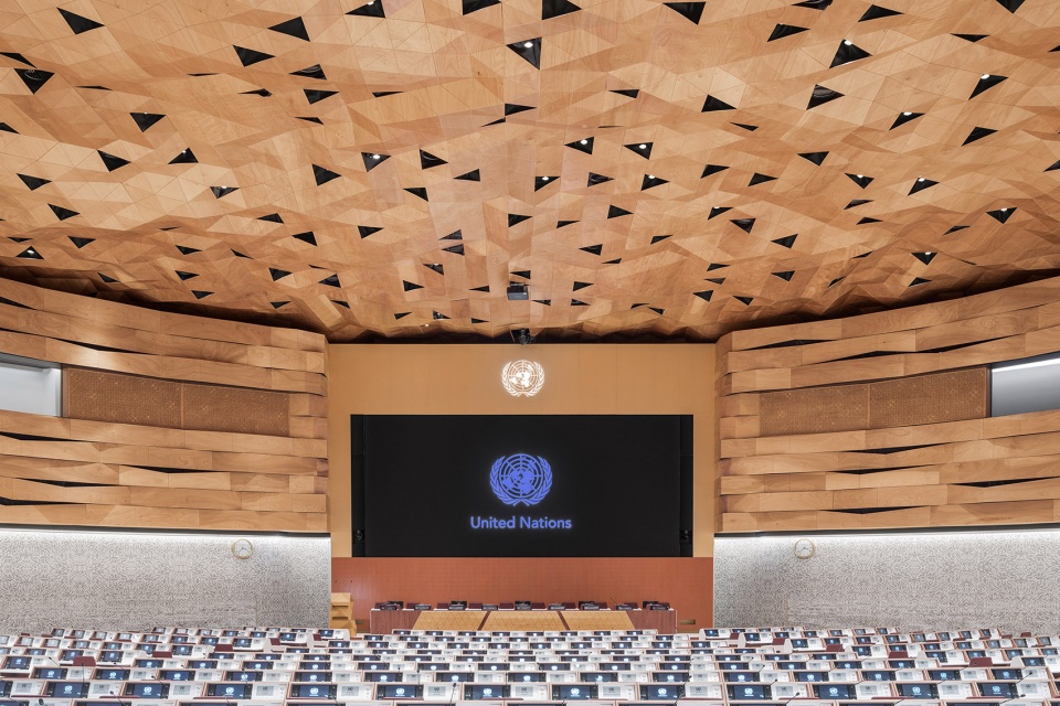 wood skin covers the dome and walls of the new assembly hall of the united nations palace in geneva