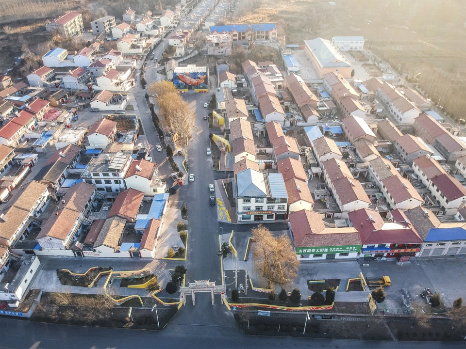 big fish revitalization of qinquan village plaza china by architectural design and research institute of tsinghua university