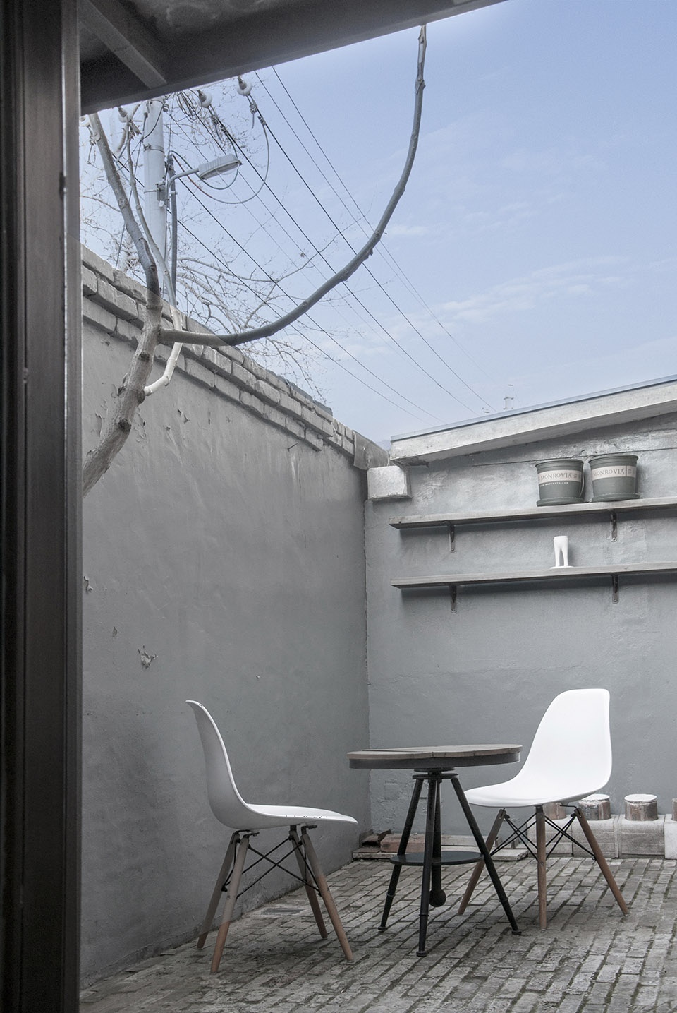 the triple layer table in nafu hutong courtyard no 13 china by pma