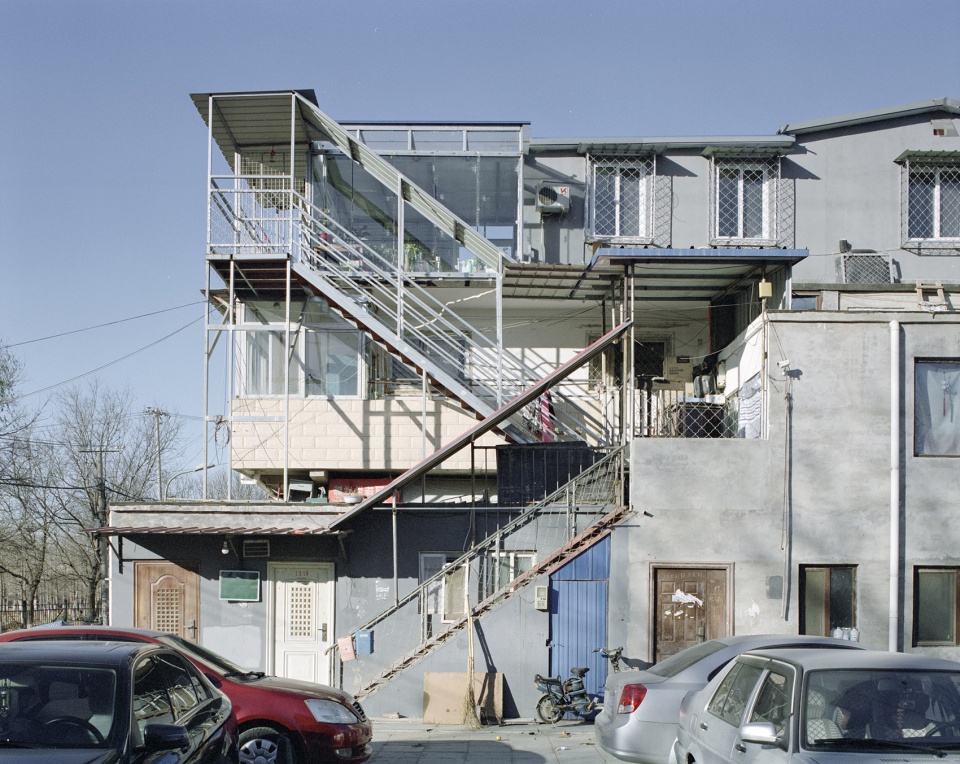 facades of village in the city by sun haiting
