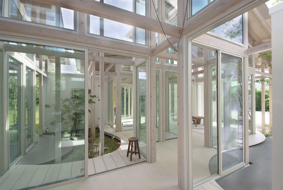 house surrounded by hedges studio velocity