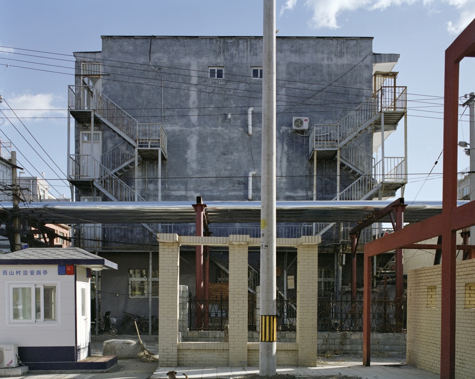 facades of village in the city by sun haiting