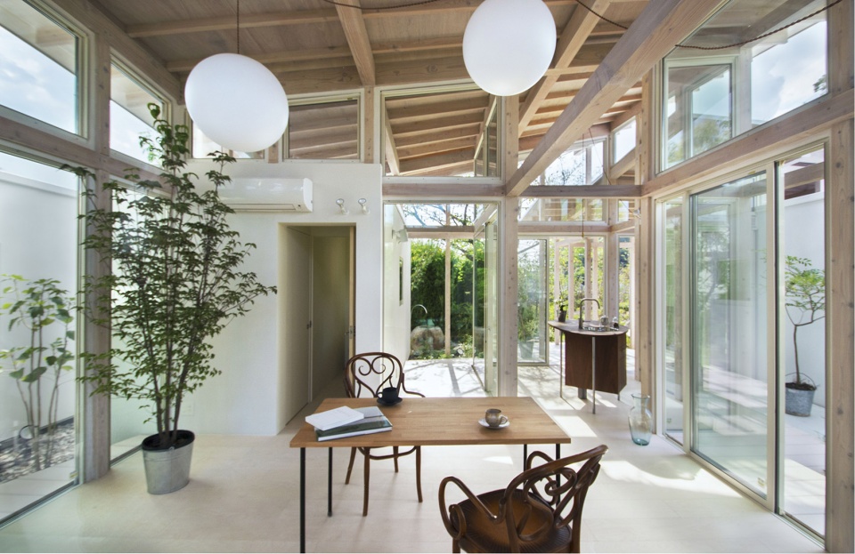 house surrounded by hedges studio velocity