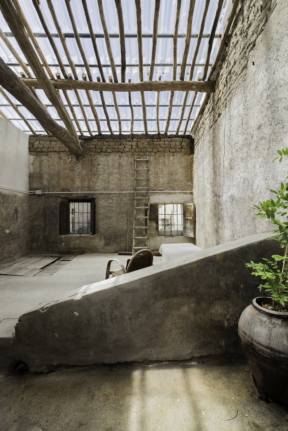 barn rehabilitation in a house by gf arquitectos
