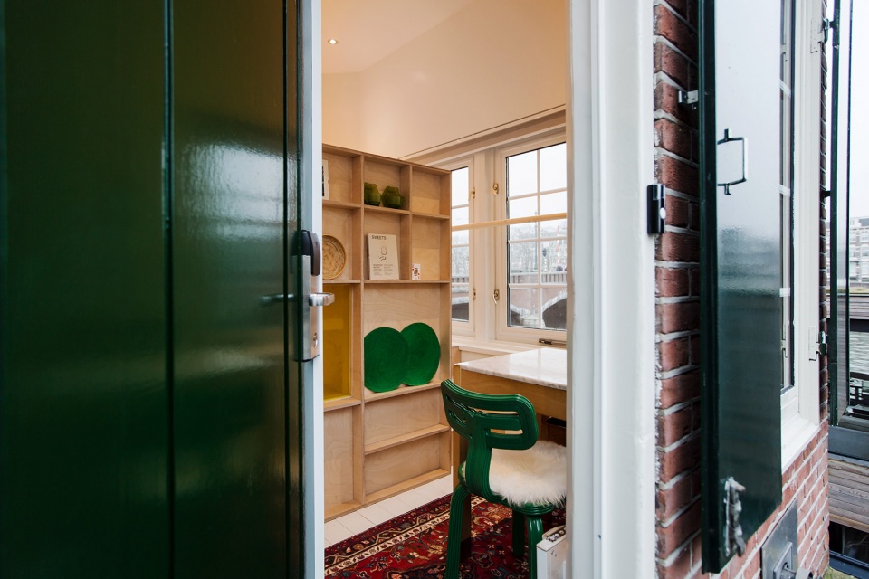 sweets hotel transforms amsterdams former bridge houses into independent hotel rooms