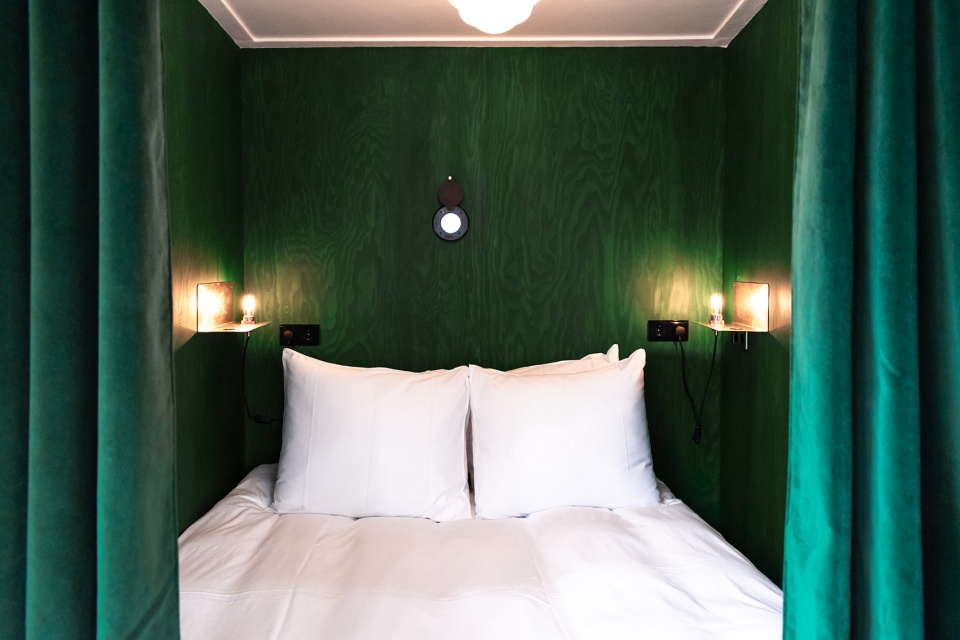 sweets hotel transforms amsterdams former bridge houses into independent hotel rooms