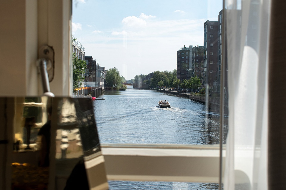 sweets hotel transforms amsterdams former bridge houses into independent hotel rooms