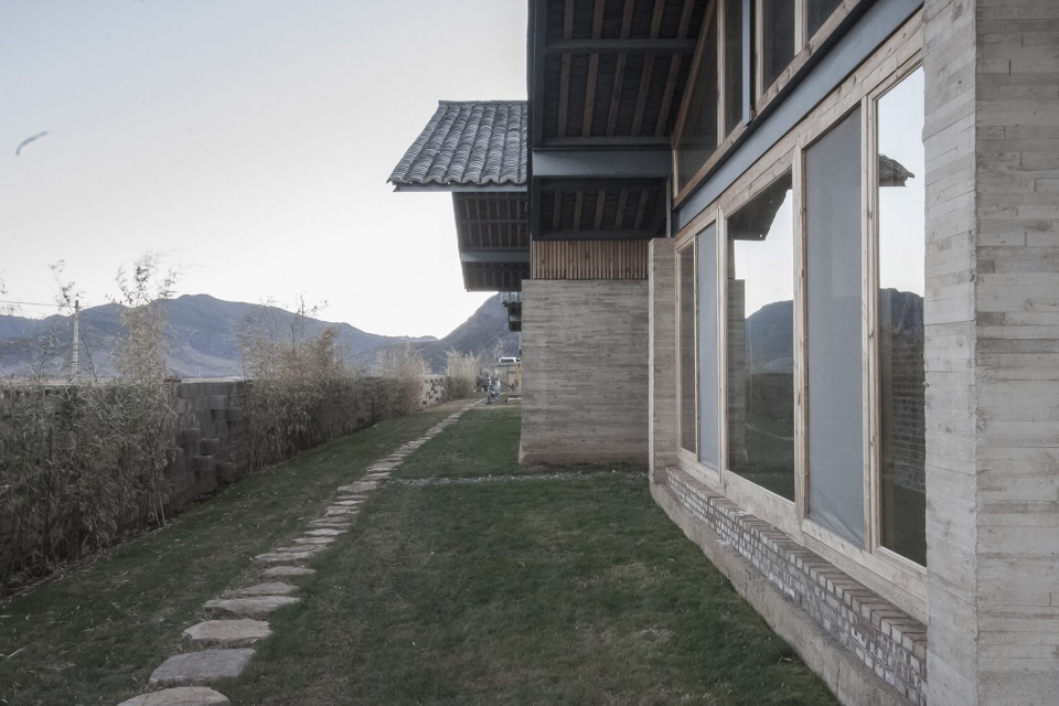 lugu lake pavilion boutique hotel by atelier8