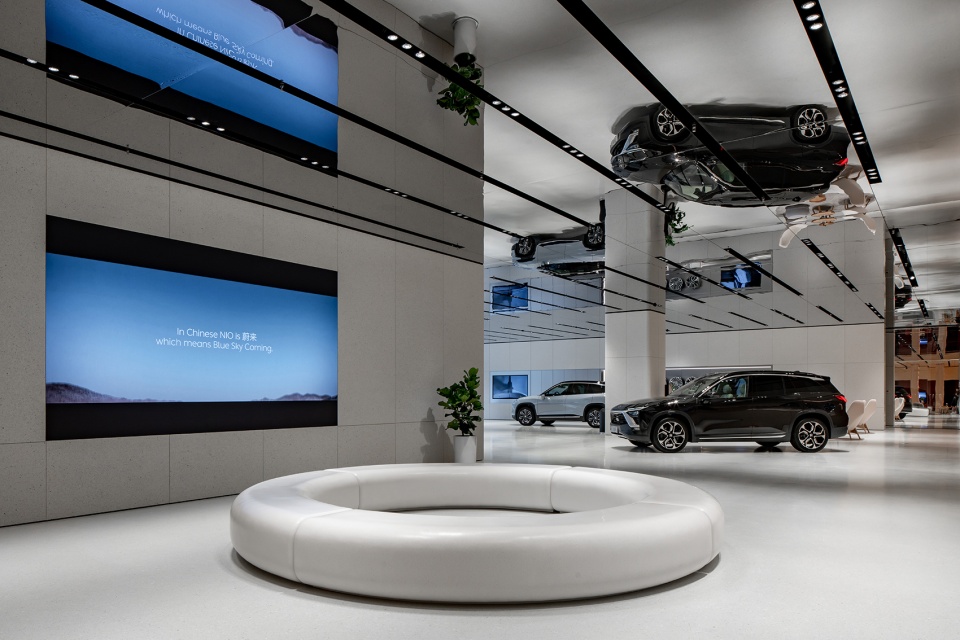 nio tianjin flagship store by raams architecture studio