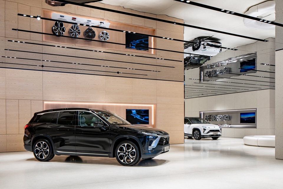 nio tianjin flagship store by raams architecture studio
