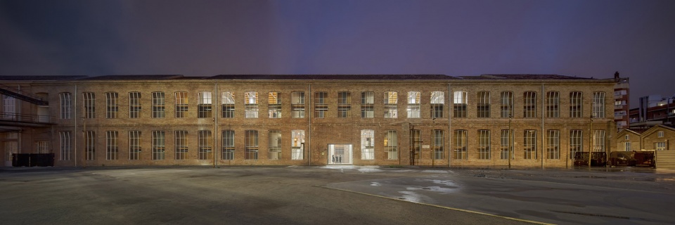 Transformation of the old thread storage building in a social housing complex by Roldan Berengue