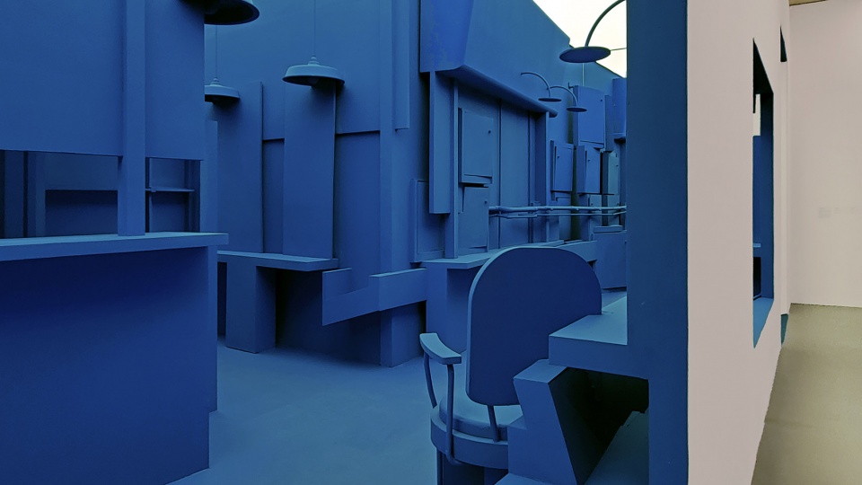 The blue base of the nine story tower by Zigeng Wang