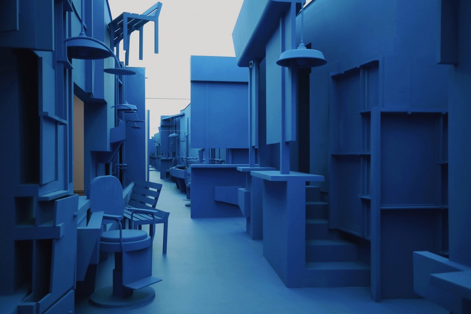The blue base of the nine story tower by Zigeng Wang