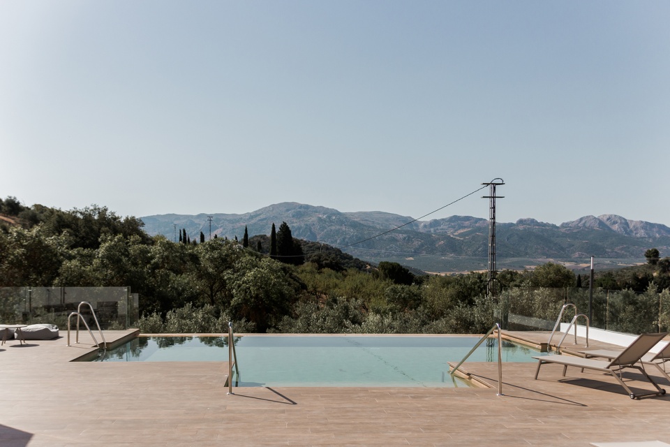 rural hotel in an olive grove by gana arquitectura