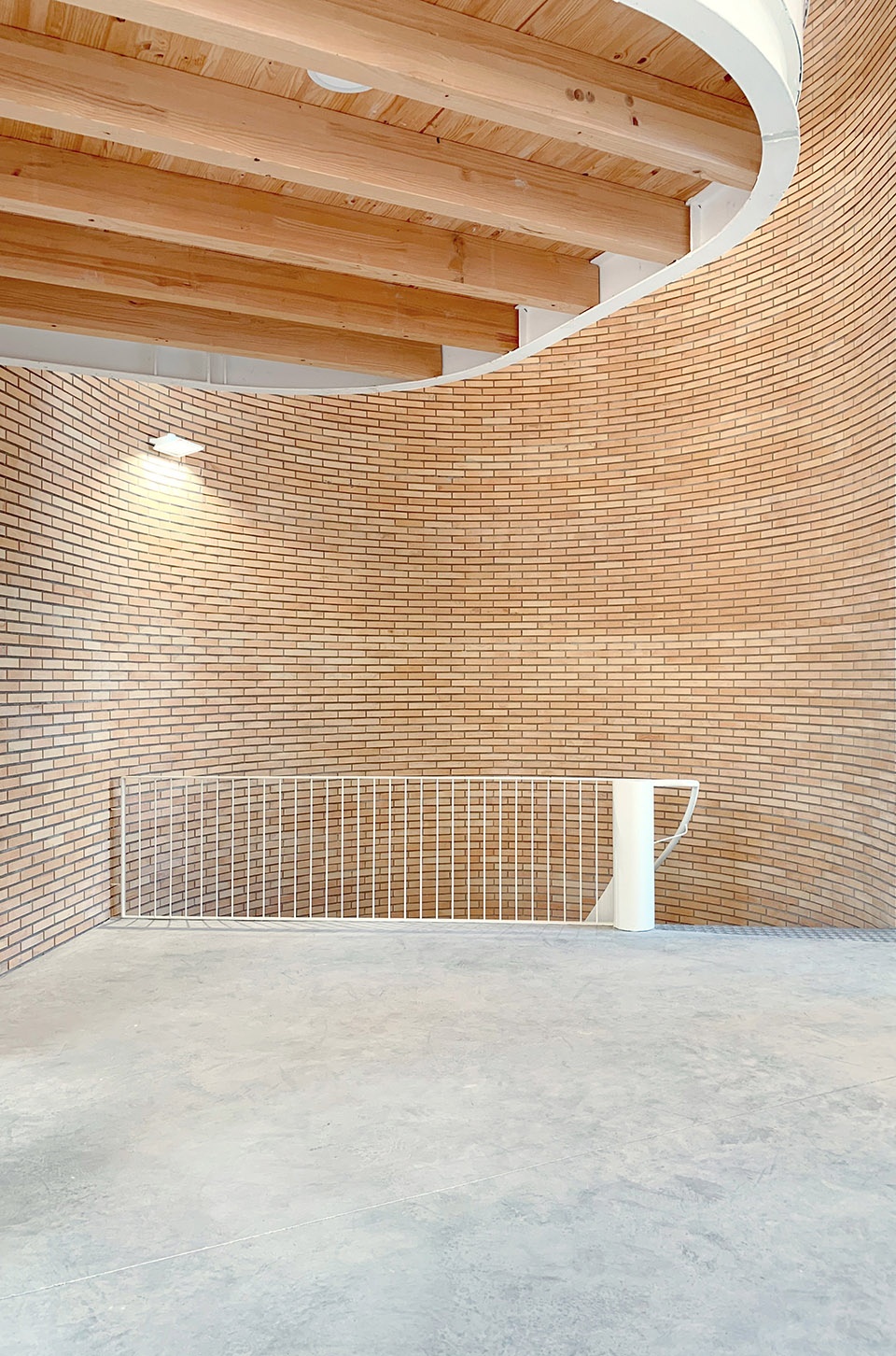 Transformation of the old thread storage building in a social housing complex by Roldan Berengue