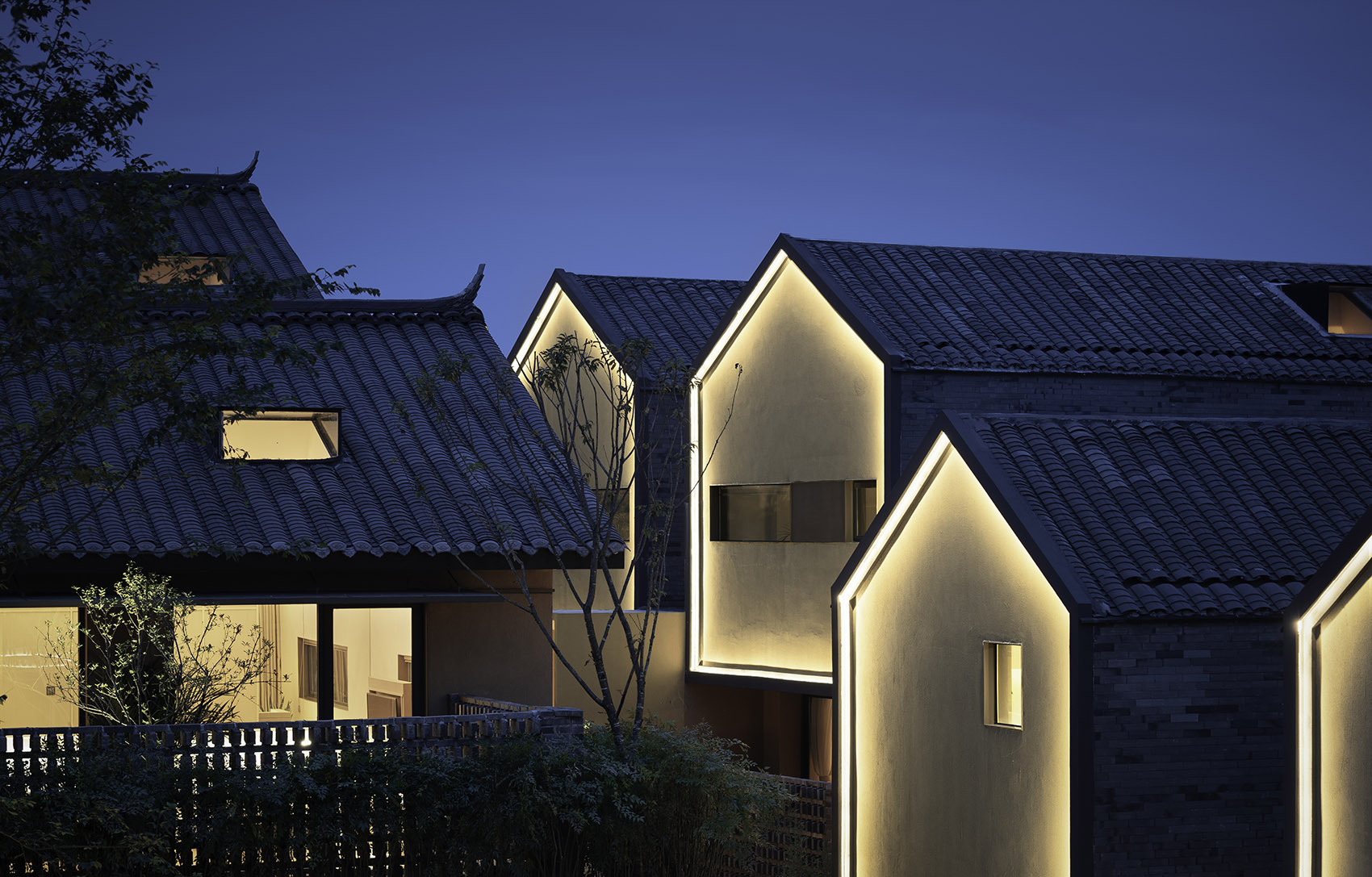 Pretty lodges built in mountains layering courtyard China by CC ARCHITECTURE SPACE
