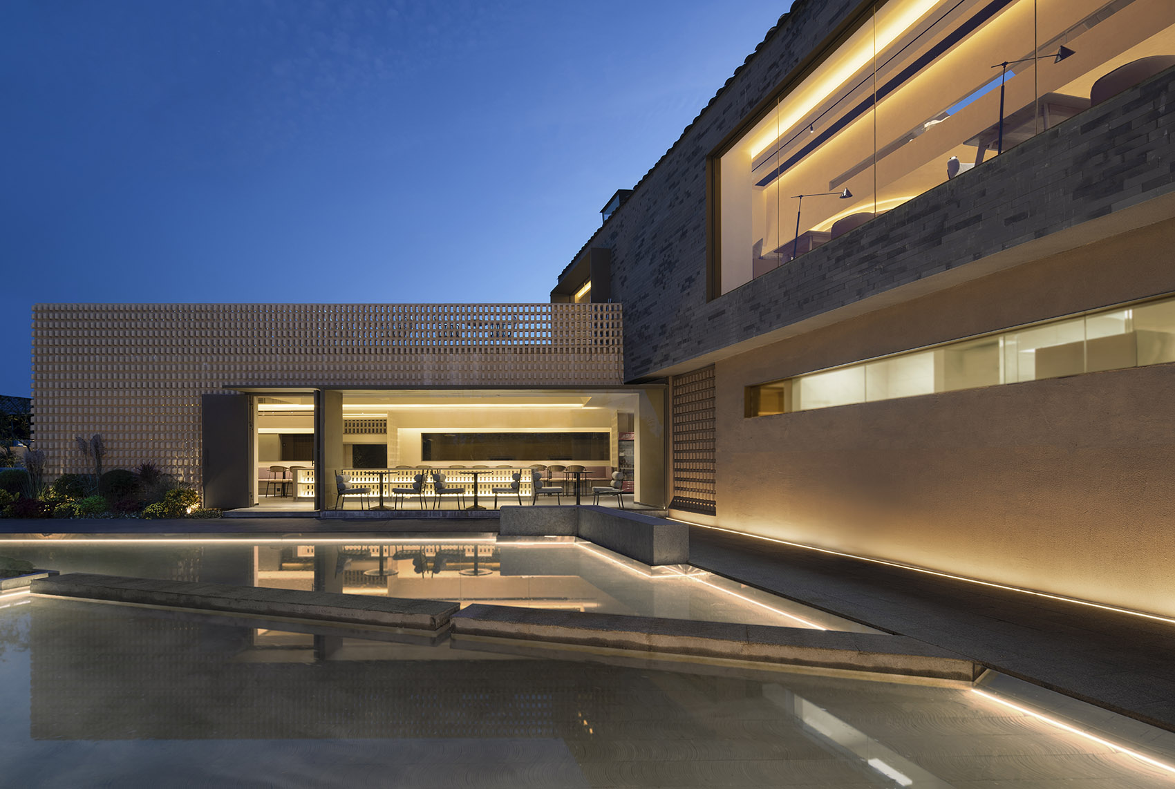 Pretty lodges built in mountains layering courtyard China by CC ARCHITECTURE SPACE