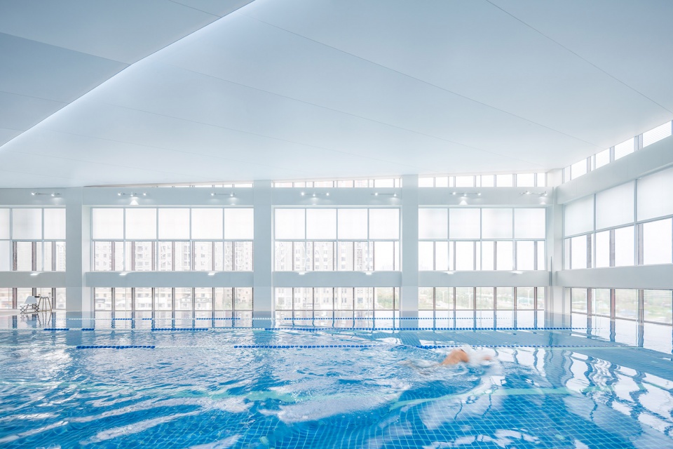 Chang Chun Time Cube Swimming Fitness Center China by STEPS architecture design