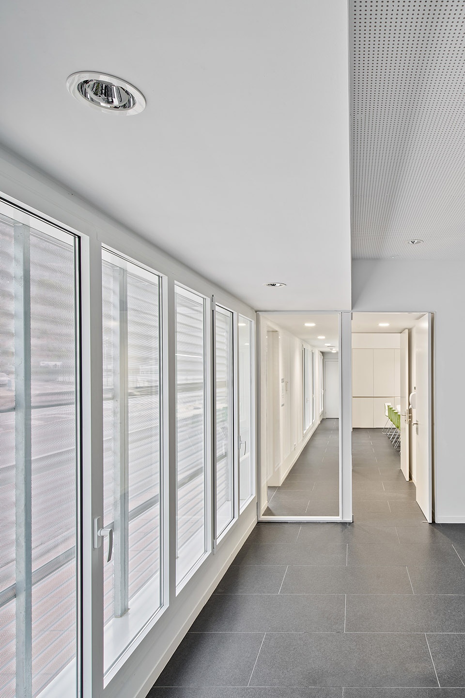 Offices and Facade Monistrol Vila FGC by AMOO