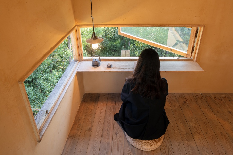 tower for meditation and view china by jumping house lab