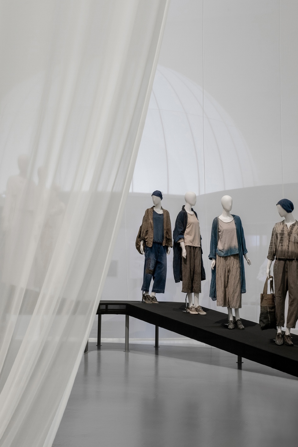 spatial design of the exhibition fashioned from nature co curated by the va and design society china by studio 10