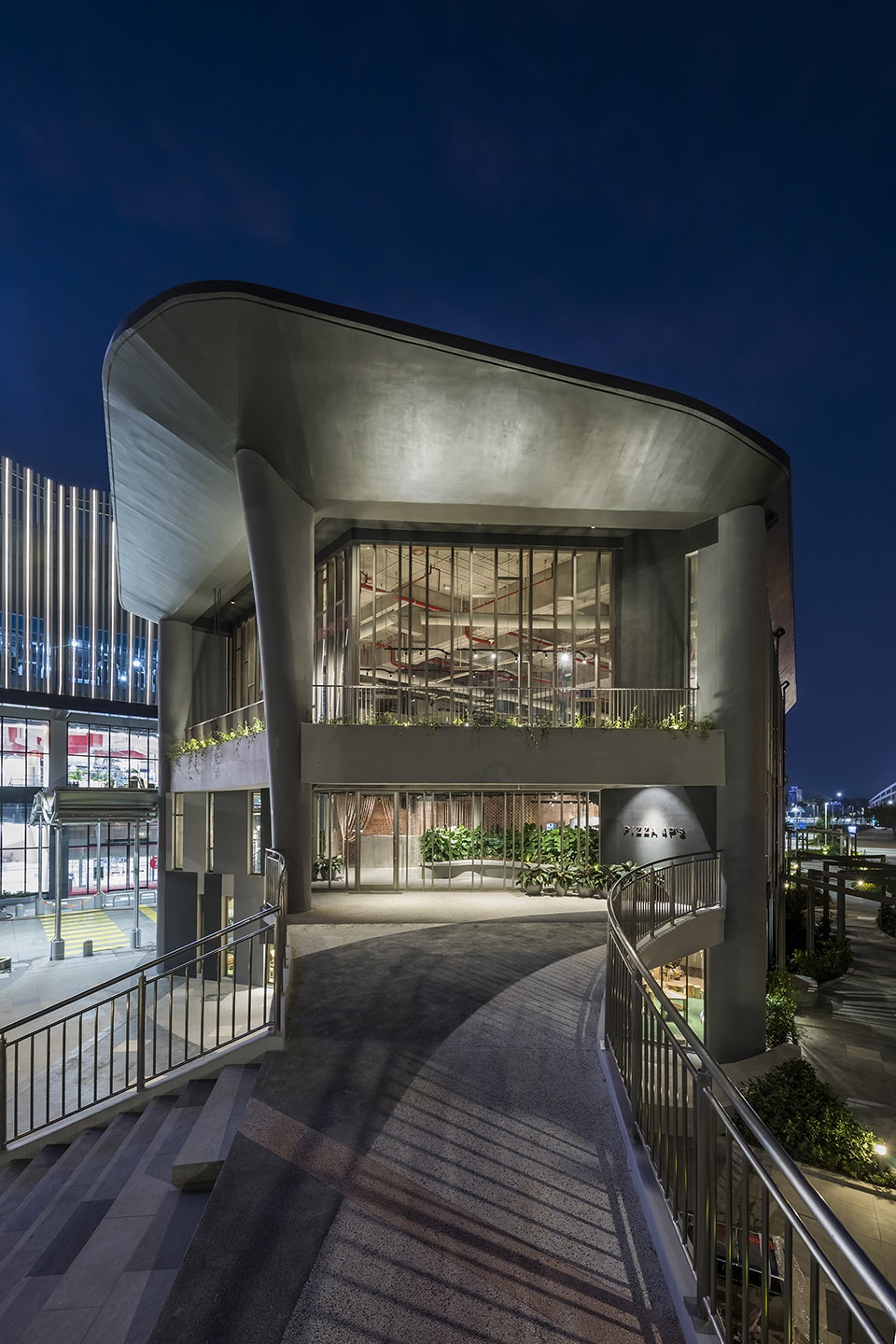 PIZZA 4P S HAI PHONG by Takashi Niwa Architects
