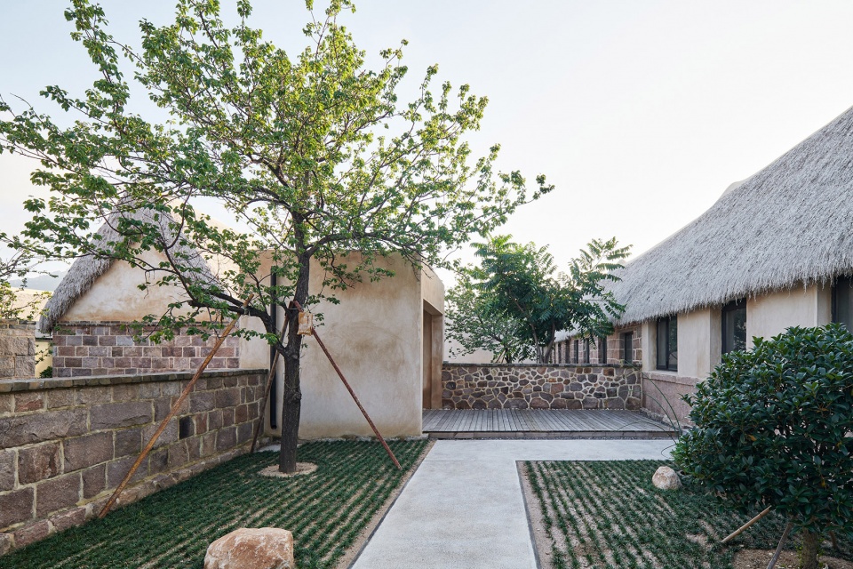 reconstruction design of seaweed bay health resort china by greyspace architects